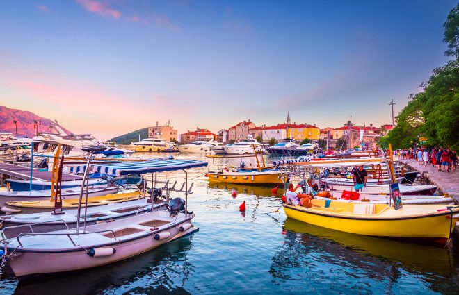 Budva coast with boats and old town